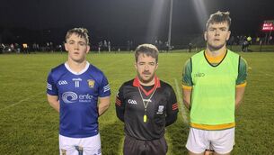 <p>Sean Lombard, Ballinhassig, referee Kevin O'Sullivan and Ryan Deasy, Ballymartle, before the Ross Oil Carrigdhoun U21 A Hurling Championship clash at Riverstick.</p>