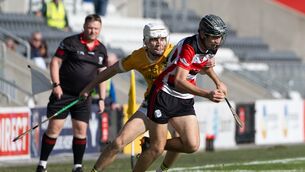<p>Ballincollig’s Kevin O’Leary under pressure from Dungourney‘s Jack Leahy. Picture: Chani Anderson</p> <p>Ballincollig’s Kevin O’Leary under pressure from Dungourney‘s Jack Leahy. Picture: Chani Anderson</p>