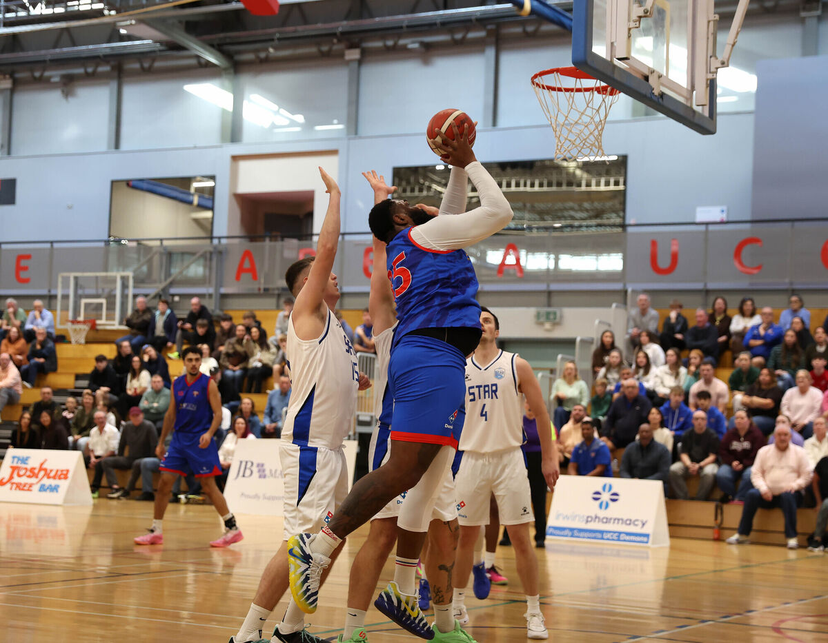 Elijah Tillman, UCC Demons, Liam Pettigrew and Rapolas Buivdas, Belfast Star. Men's Superleague Basketball, UCC Demons V's Belfast Star, at the Mardyke Arena, Mardyke, Cork. Elijah Tillman, UCC Demons, Liam Pettigrew and Rapolas Buivdas, Belfast Star. Men's Superleague Basketball, UCC Demons V's Belfast Star, at the Mardyke Arena, Mardyke, Cork.