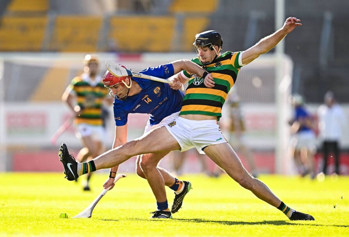 STRETCH: The Barrs' Brian Hayes tries to keep the long legs of hi Cork colleague Rob Downey at bay during Sunday's Cork Premier SHC final at SuperValu Páirc Uí Chaoimh. Pic: Seb Daly/Sportsfile