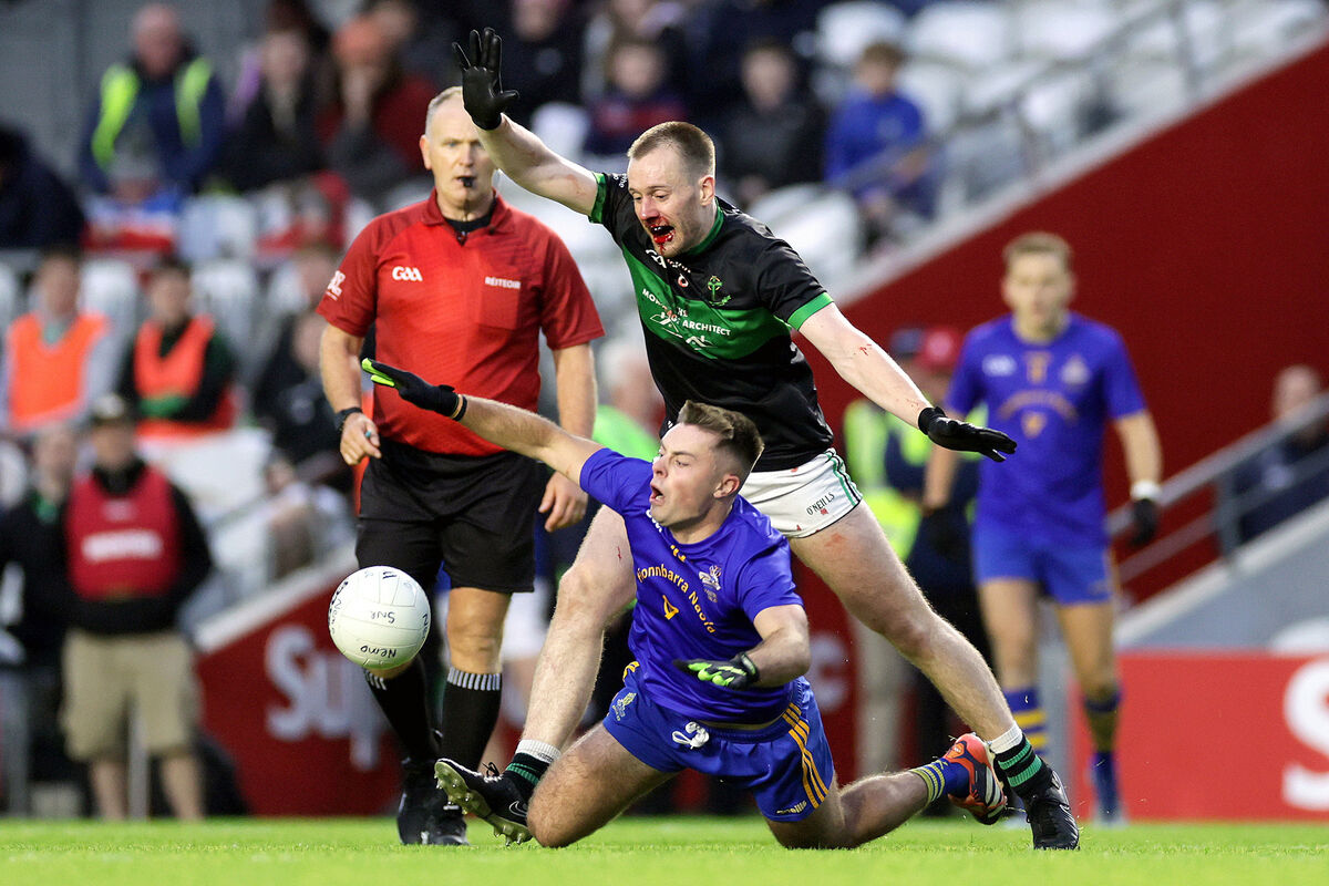 St Finbarr’s William Buckley and Alan O'Donovan of Nemo Rangers battle for the ball. Picture: Laszlo Geczo/INPHO