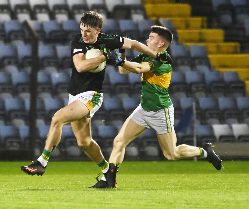 Cobh's Conor McLoughlin is tackled by Kilmurry's Gearóid O'Mahony. Picture: Eddie O'Hare