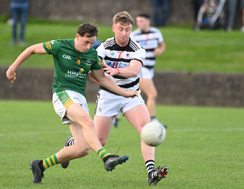 Cobh's Jeff McCarthy shoots from St Nick's Eoghan Varian. Picture: Eddie O'Hare
