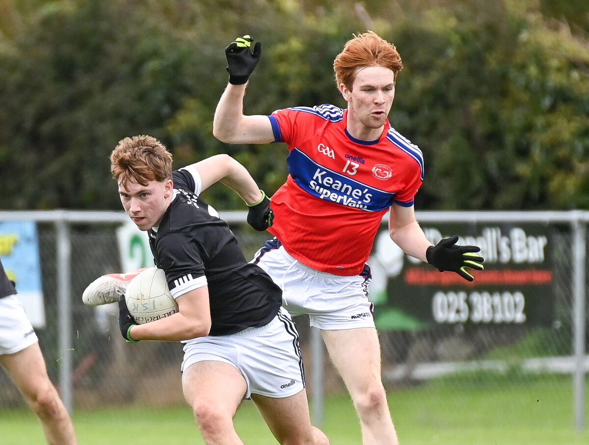  John Dollard Young of St Francis College Rochestown gets away from Tomas Joy of Intermediate School Killorglin during their TUS Corn Ui Mhuiri clash at Glanworth.
