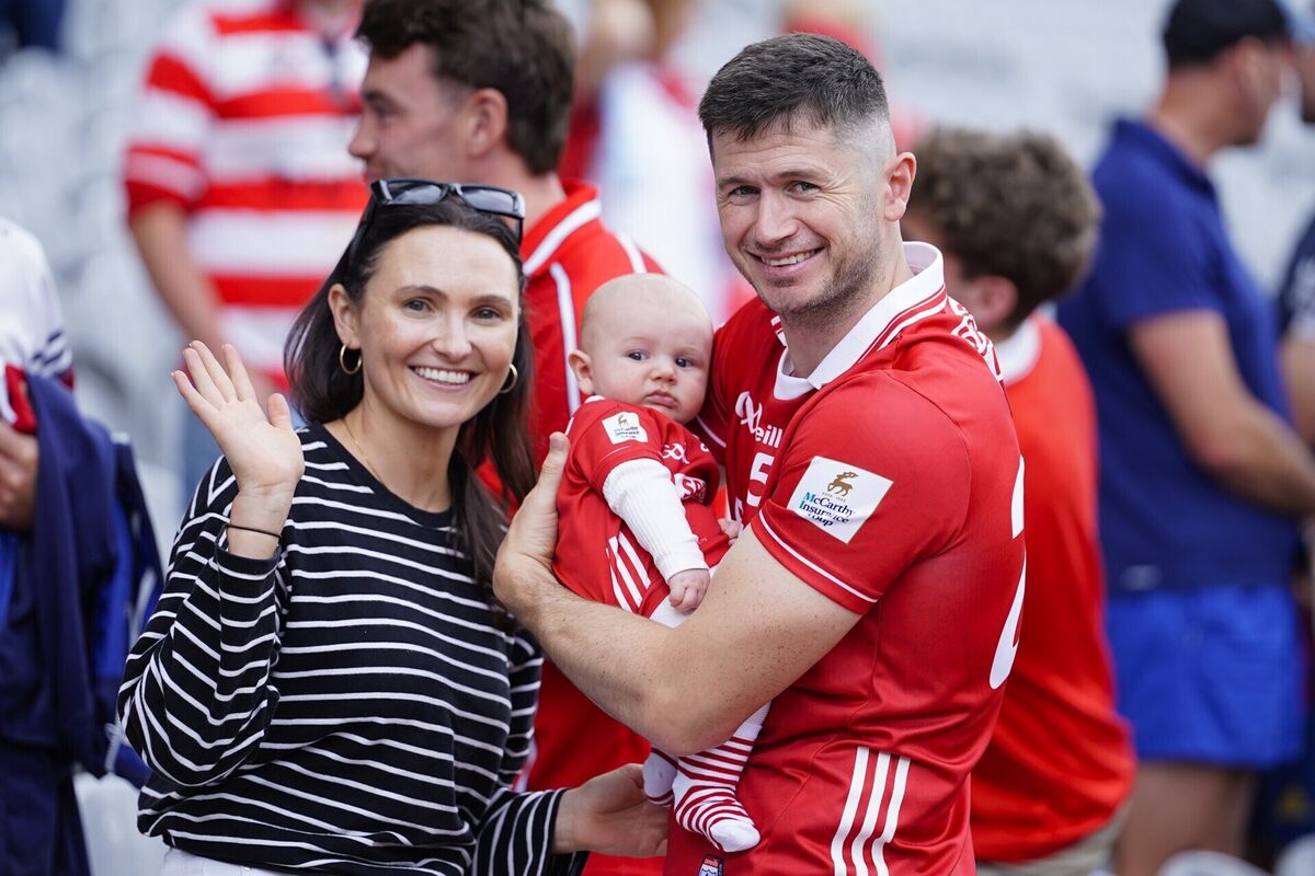 Séamus Harnedy of Cork with his wife Aisling and baby Joey after Cork's All-Ireland SHC semi-final loss to Galway in July. Picture: Inpho/James Lawlor