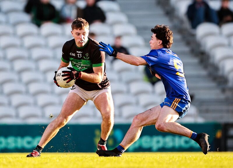 Ross Corkery of Nemo Rangers takes on Colm Scully of St Finbarr's. Picture: Thomas Flinkow/Sportsfile