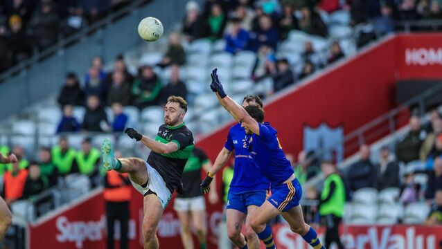 <p>Ronan Dalton lands a point for Nemo against the Barrs. Picture: David Ribeiro/INPHO</p>