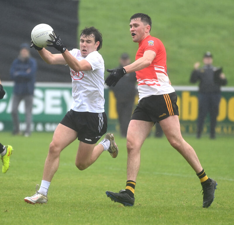 Kiskeam's Eoghan Daly wins the ball from Fermoy's Gary O'Callaghan. Picture: Eddie O'Hare