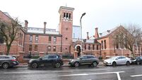 Cork man accused of heroin dealing kisses partner during court case
