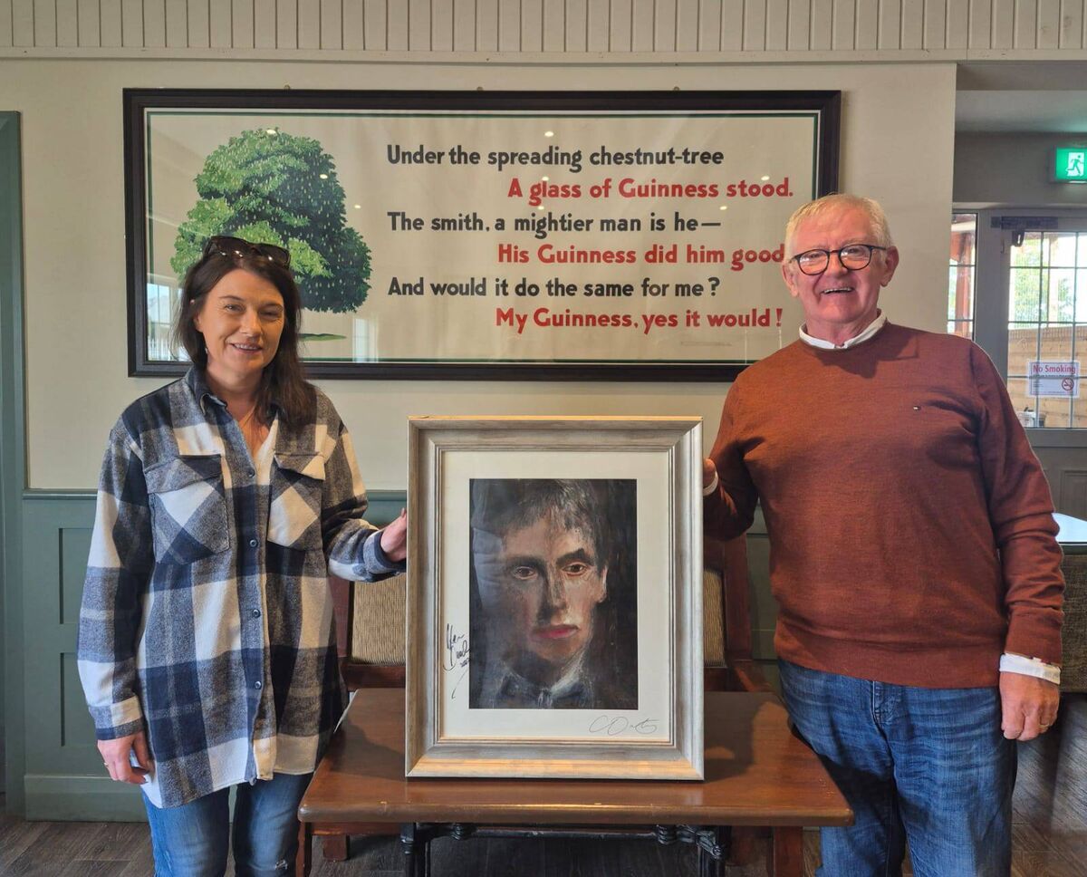 Linda Corkery and Berard Kelleher with a painting of snooker star Ken Doherty, who visited the bar, and a poem on the wall based on the original that gave The Spreading Chestnut its name Linda Corkery and Berard Kelleher with a painting of snooker star Ken Doherty, who visited the bar, and a poem on the wall based on the original that gave The Spreading Chestnut its name