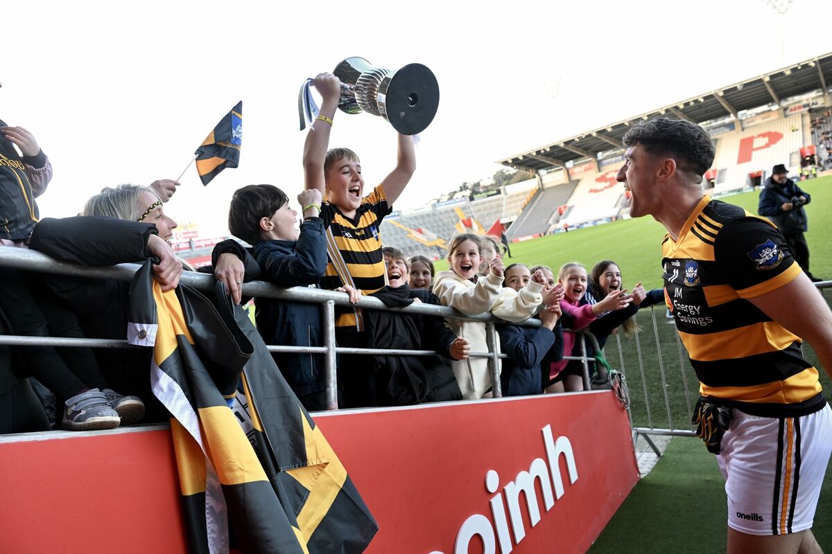 Canovee co-captain Evan Dodd with young supporters after beating Cobh. Picture: Larry Cummins Canovee co-captain Evan Dodd with young supporters after beating Cobh. Picture: Larry Cummins