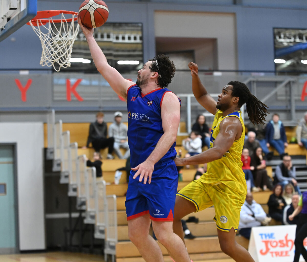 UCC Demons' David Lehane lays up a basket from St. Vincent's Dorian Lagoeyte during the Domino's Men's Super League at The Mardyke Arena. Picture: Eddie O'Hare UCC Demons' David Lehane lays up a basket from St. Vincent's Dorian Lagoeyte during the Domino's Men's Super League at The Mardyke Arena. Picture: Eddie O'Hare