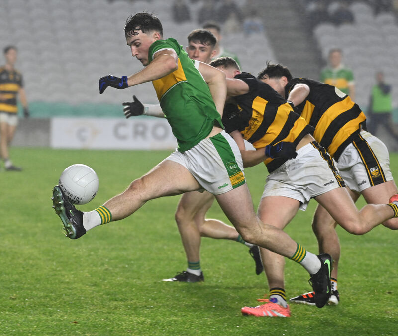 Kilmurry's Denis O'Mullane goes past Buttevant's Tadhg O'Connell and Kevin Crowley. Picture: Eddie O'Hare Kilmurry's Denis O'Mullane goes past Buttevant's Tadhg O'Connell and Kevin Crowley. Picture: Eddie O'Hare