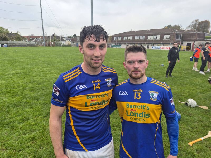 Diarmuid Ó Mathúnas heroes Caolan O'Donovan and Jamie Lucey after beating Whitechurch. 
