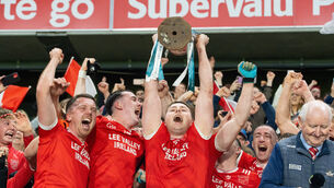 <p> Uibh Laoire captain Cathal Vaughan lifts the cup. Picture: Noel Sweeney</p> <p> Uibh Laoire captain Cathal Vaughan lifts the cup. Picture: Noel Sweeney</p>