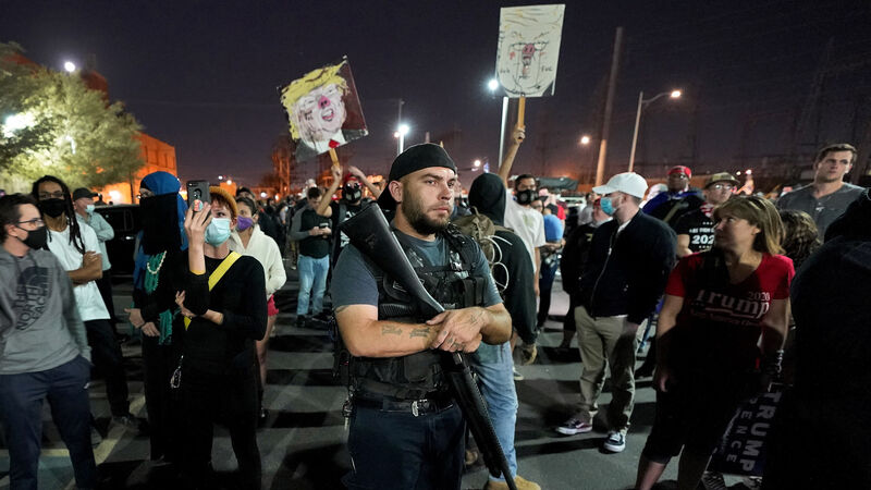 Trump supporters demand halt to vote counting – while others insist it goes on