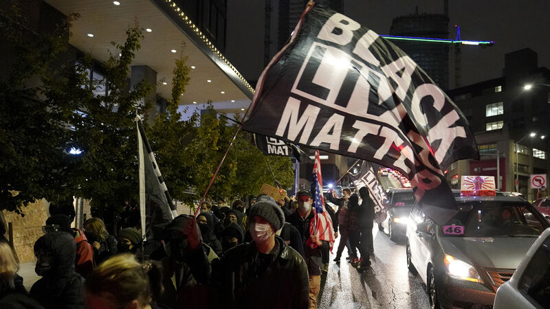 Anti-Trump protesters gather near White House