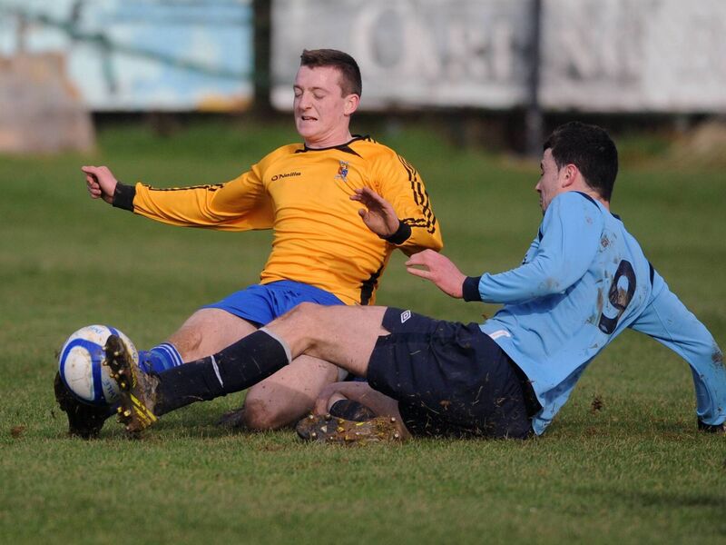 Avondale United's Danny Long and Stephen Carroll battle for the ball in 2013. Picture: Eddie O'Hare