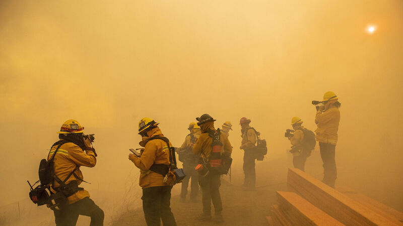 Thousands evacuated amid California fires