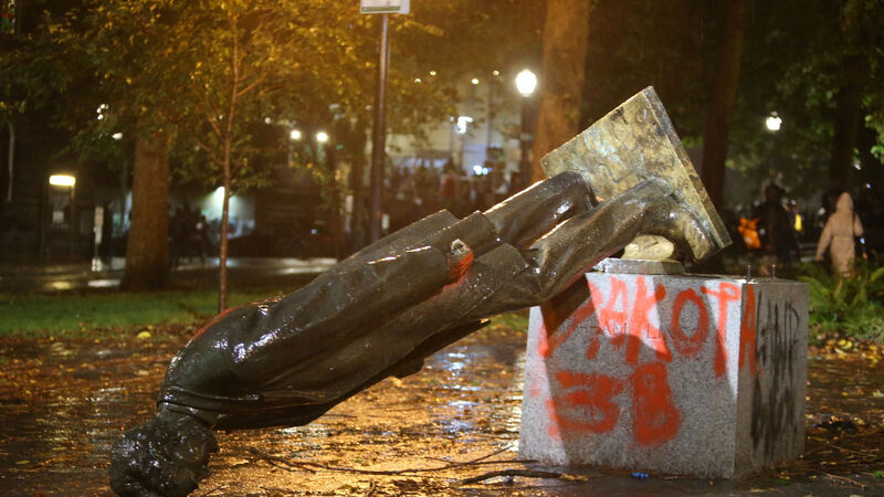 Activists topple statues of Roosevelt and Lincoln amid Columbus Day protests