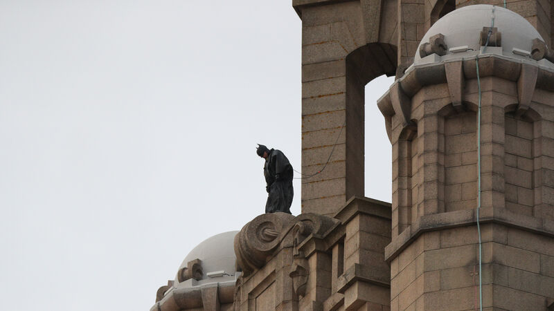 Batman stunt double spotted on top of Liverpool’s Royal Liver Building