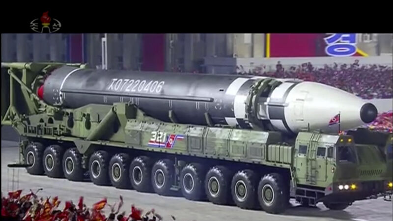 North Korea unveils new weapons at military parade