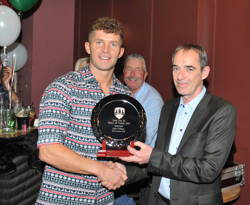 Hall of Fame recipient John O'Flynn is presented with his award by Brian Lennox, in 2019. Picture: Larry Cummins. Hall of Fame recipient John O'Flynn is presented with his award by Brian Lennox, in 2019. Picture: Larry Cummins.