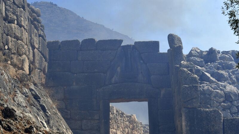 Wildfire stopped at gate of ancient fortress city in Greece