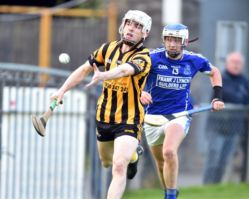 Russell Rovers' Pearse Cummins gets the sliotar away from Milford's Kieran O'Flynn. Picture: Eddie O'Hare