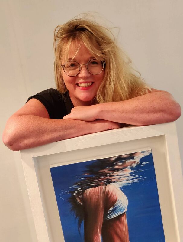 Mary Murphy with one of her series of underwater oil paintings on show at the Owenabue Arts Collective Exhibition at The Gallery, Main Street, Carrigaline Mary Murphy with one of her series of underwater oil paintings on show at the Owenabue Arts Collective Exhibition at The Gallery, Main Street, Carrigaline