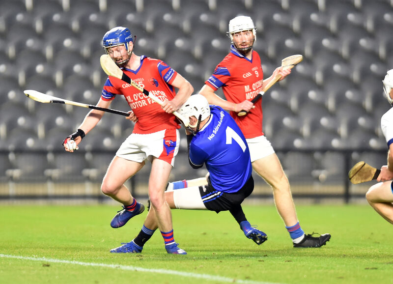 Erin's Own's Cian O'Callaghan is tackled by Sarsfields goalkeeper Alan Kennedy. Picture: Eddie O'Hare Erin's Own's Cian O'Callaghan is tackled by Sarsfields goalkeeper Alan Kennedy. Picture: Eddie O'Hare