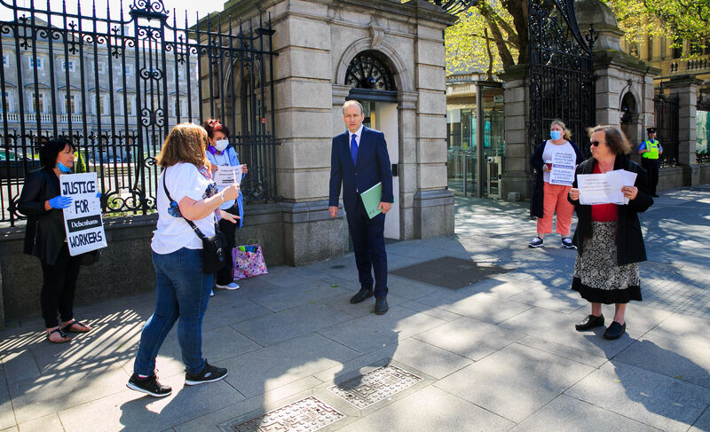 Fianna FAil leader Micheal Martin speaks to Debenhams staff during a protest by Debenhams workers at Leinster House on Kildare Street Dublin in July. Fianna FAil leader Micheal Martin speaks to Debenhams staff during a protest by Debenhams workers at Leinster House on Kildare Street Dublin in July.