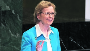<p class="contextmenu internal_Caption">Mary Robinson, who served as United Nations High Commissioner for Human Rights from 1997 to 2002, wearing an SDG badge.</p>