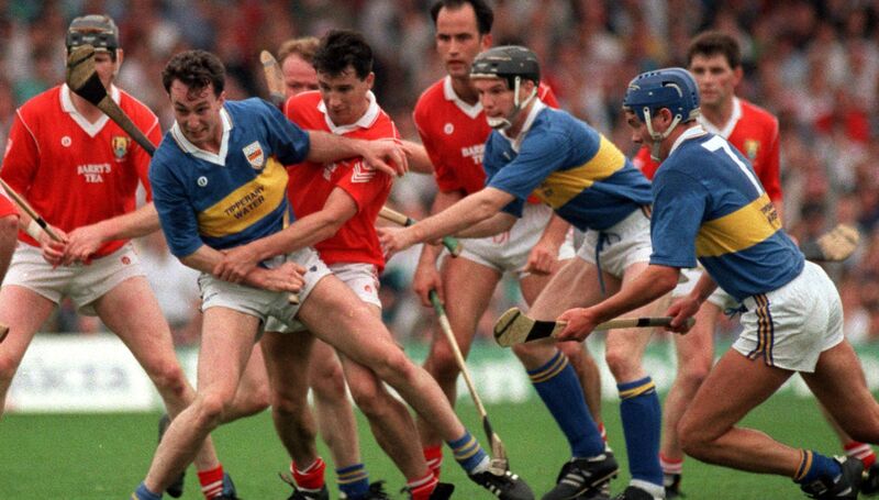 A tussle for possession in the Tipp danger area between Cork players Kevin Hennessy, Tomás Mulcahy, Mark Foley and Tipp's Michael Ryan and Conal Bonnar in 1991. A tussle for possession in the Tipp danger area between Cork players Kevin Hennessy, Tomás Mulcahy, Mark Foley and Tipp's Michael Ryan and Conal Bonnar in 1991.