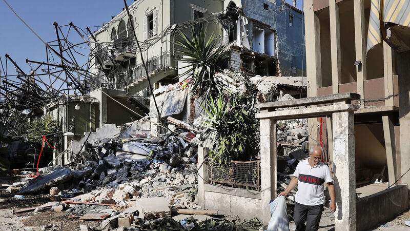Macron urges reform as Lebanese officials seek to shift blame over blast Macron urges reform as Lebanese officials seek to shift blame over blast
