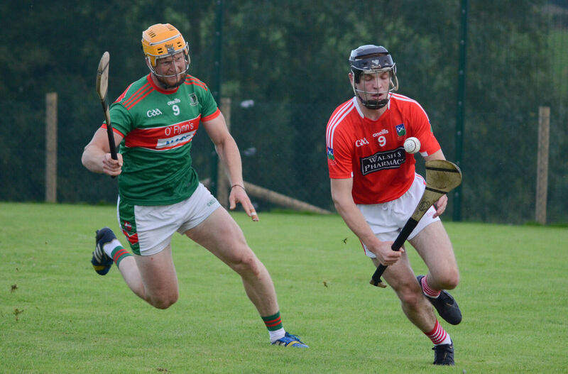 Kilworth's Jeremy Siach pulls away from Fr O'Neill's Mark O'Keeffe. Picture: Howard Crowdy