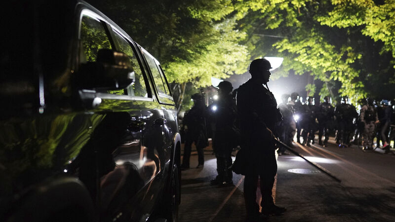 Protesters march to police union building amid nightly disruption in Portland