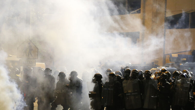 Demonstrators clash with police during protest in Virginia