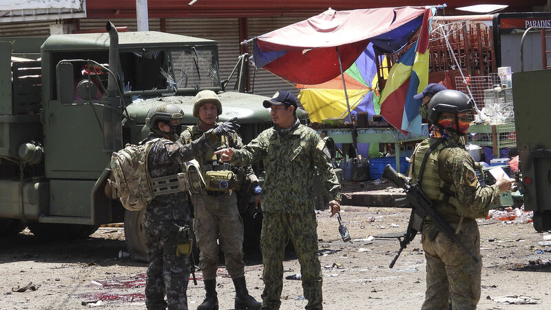 Army chief says suicide bombers behind deadly Philippine attacks Army chief says suicide bombers behind deadly Philippine attacks