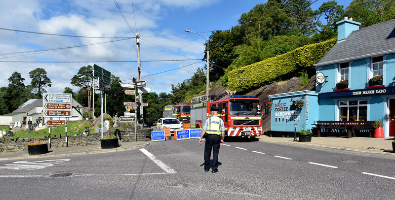 A local Garda on duty at Glengarriff, West Cork at the start of the Kenmare road near where a car entered the water in the early hours of today and two men died. Picture Dan Linehan