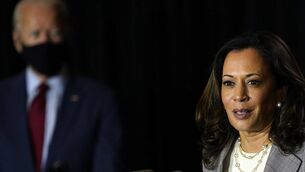 <p class="contextmenu internal_Caption">DREAM TEAM? Democratic presidential candidate Joe Biden looks on as his running mate Kamala Harris delivers a speech.</p>