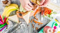 Mother preparing school lunch box