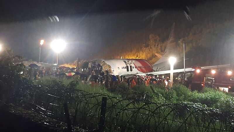 At least 16 dead and dozens injured after plane skids off runway in India At least 16 dead and dozens injured after plane skids off runway in India