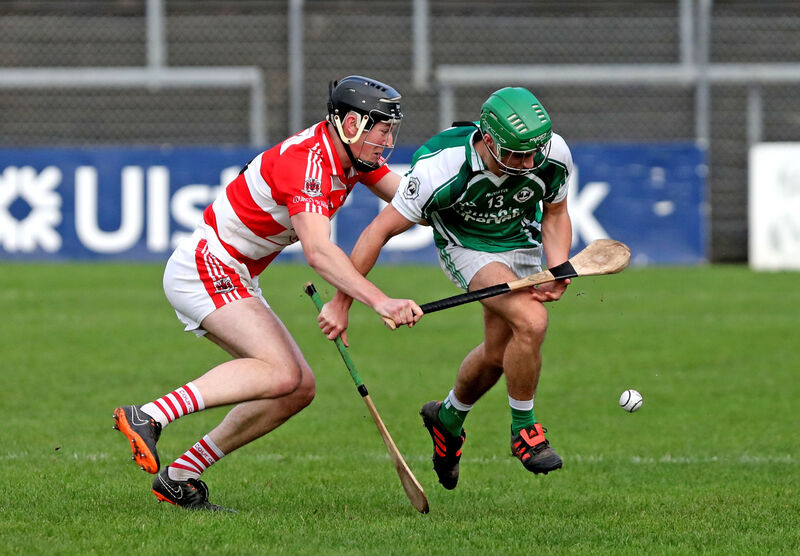 Shane Murphy, Ballincollig, battling Denis Coghlan, Courcey Rovers. Picture: Jim Coughlan