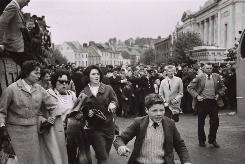 People break through the Gardaí on Parnell Place during JFK's visit to Cork. People break through the Gardaí on Parnell Place during JFK's visit to Cork.