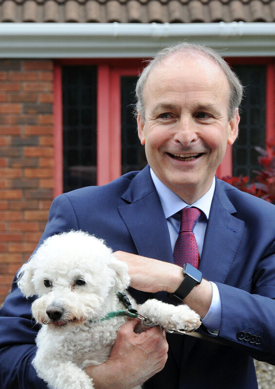 An Taoiseach, Micheál Martin, T.D., with the family dog, Setanta, on his return home to Ballinlough in Cork.Picture Denis Minihane. An Taoiseach, Micheál Martin, T.D., with the family dog, Setanta, on his return home to Ballinlough in Cork.Picture Denis Minihane.