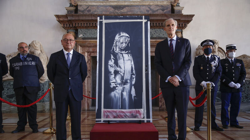 Italy returns stolen Banksy to France on Bastille Day Italy returns stolen Banksy to France on Bastille Day