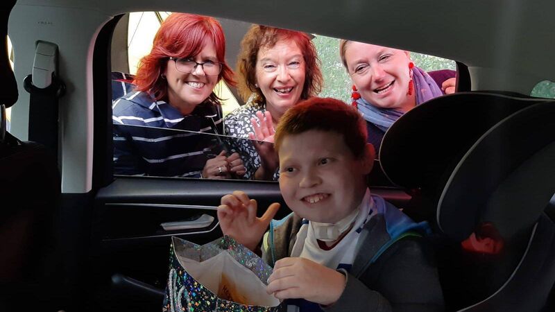 Pictures: All smiles at drive-by graduation for inspirational students in Cork city school 