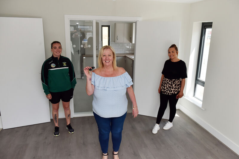 Mary O'Mahony who got the keys to the new council house at Beara Drive off Harbour View Road in Knocknaheeny, with with her daughters Abby Power and Orla O'Mahony Picture: Eddie O'Hare Mary O'Mahony who got the keys to the new council house at Beara Drive off Harbour View Road in Knocknaheeny, with with her daughters Abby Power and Orla O'Mahony Picture: Eddie O'Hare