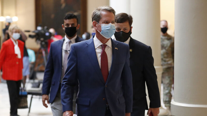Georgia governor and Atlanta mayor face-off in masks row